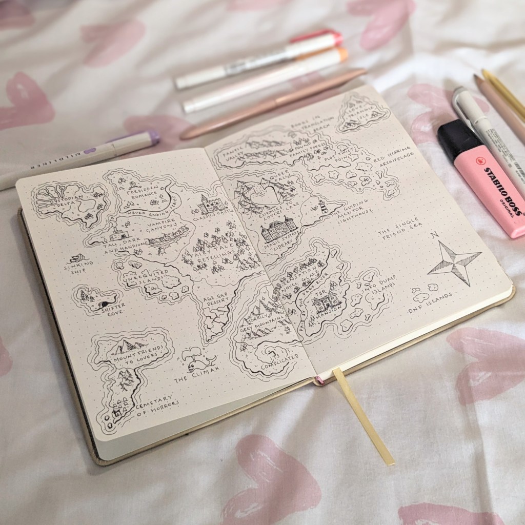 A decorative hand-drawn map spread in a reading journal